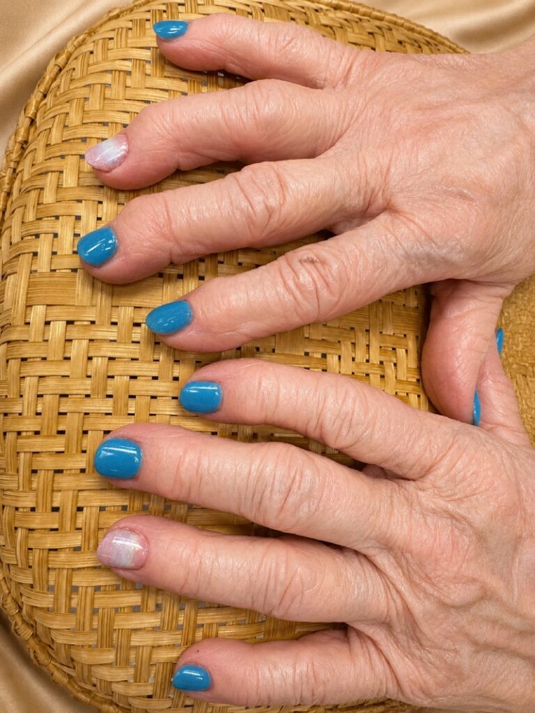 A fresh manicure showcases the quality nail services available at a nail salon 74525.